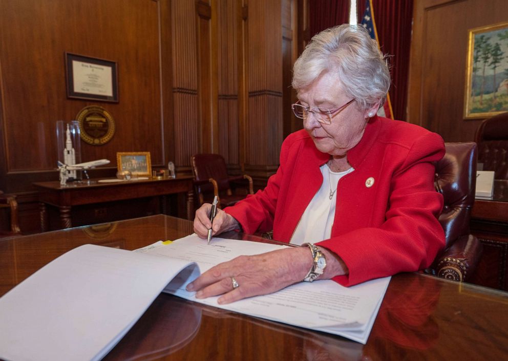 PHOTO: Alabama Governor, Kay Ivey, signs the Law on the Protection of Human Life in Alabama, after both Houses of the Alabama Legislature passed HB314 on 15 May 2019.
