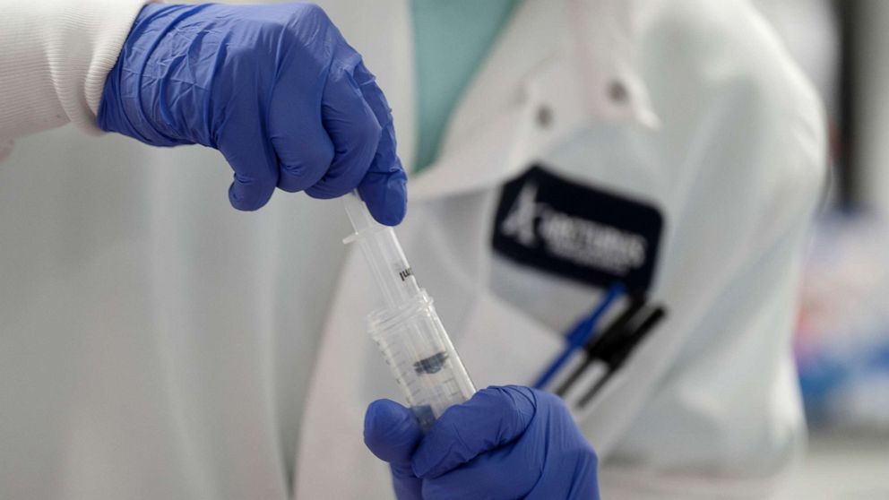FILE PHOTO: A scientist conducts research on a vaccine for the novel coronavirus (COVID-19) at the laboratories of RNA medicines company Arcturus Therapeutics in San Diego, California, U.S., March 17, 2020.