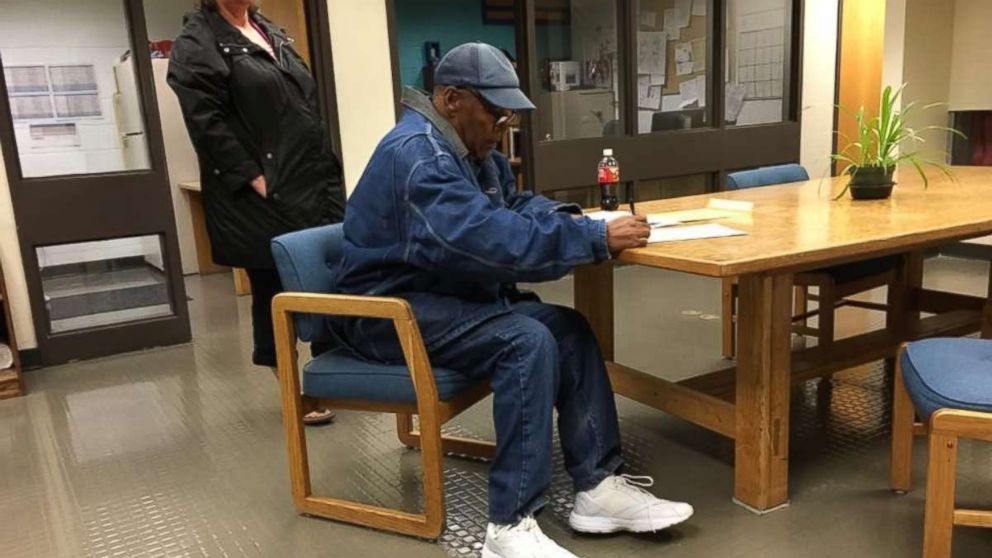 In a photo provided by the Nevada Department of Corrections, Simpson is seen signing paperwork upon his release from prison Sunday, Oct. 1, 2017.