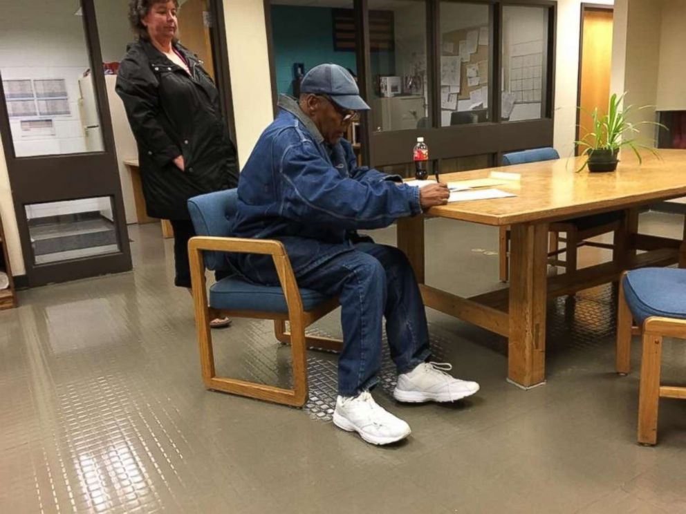 In a photo provided by the Nevada Department of Correction, Simpson is seen signing paperwork upon his release from prison Sunday, Oct. 1, 2017.