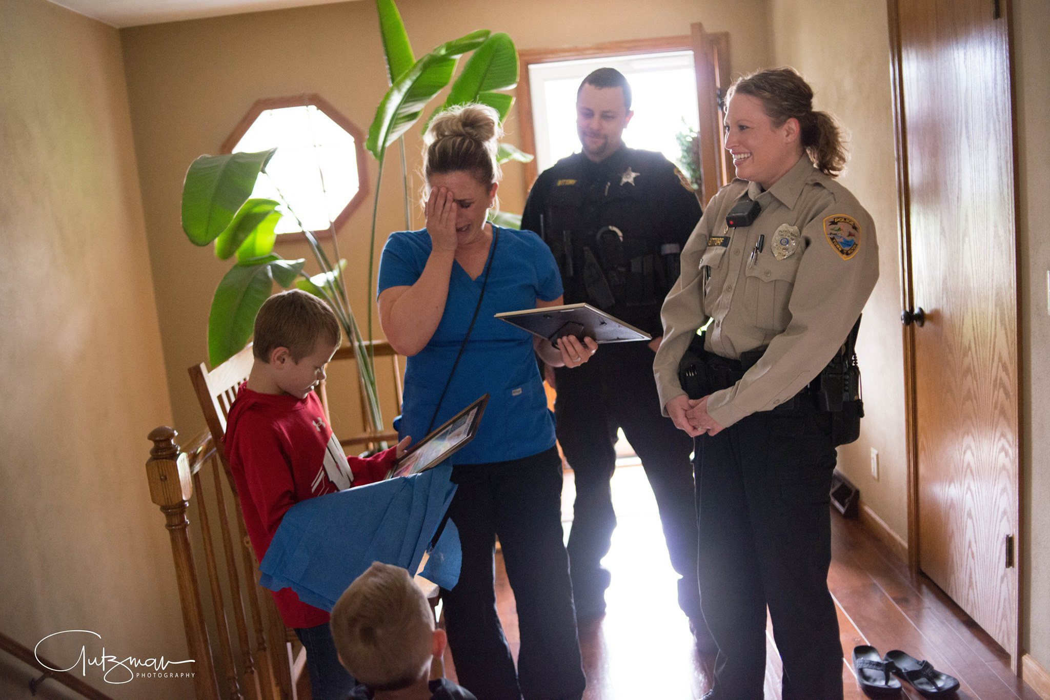 PHOTO: Officer Lindsey Bittorf surprised a family in Janesville, Wisconsin, with news that she will be donating her kidney to their 8-year-old son, Jackson Arneson.