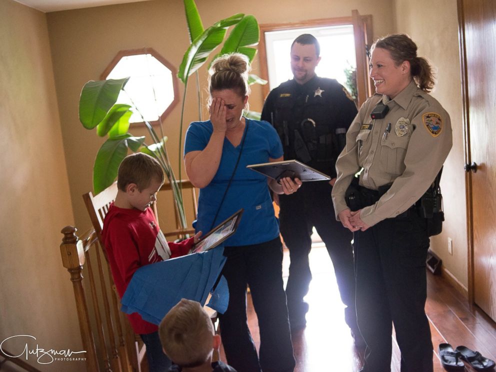 PHOTO: Officer Lindsey Bittorf surprised a family in Janesville, Wisconsin, with news that she will be donating her kidney to their 8-year-old son, Jackson Arneson.