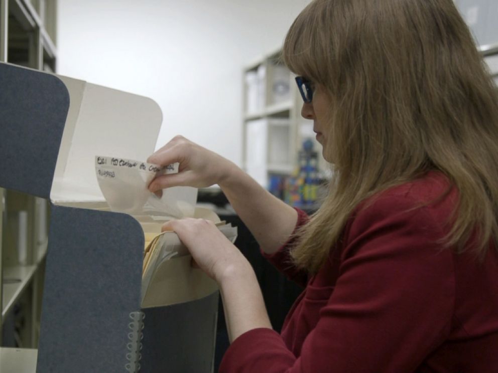PHOTO: Historian Samantha Bradbeer looking through company archive.