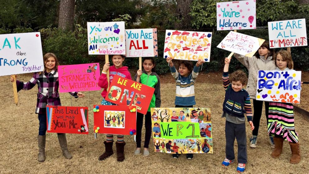 PHOTO: Danny Vincent hosted a sign-making party with family and friends in her DeKalb County, Georgia, home to make signs of support for the International Community School. 
