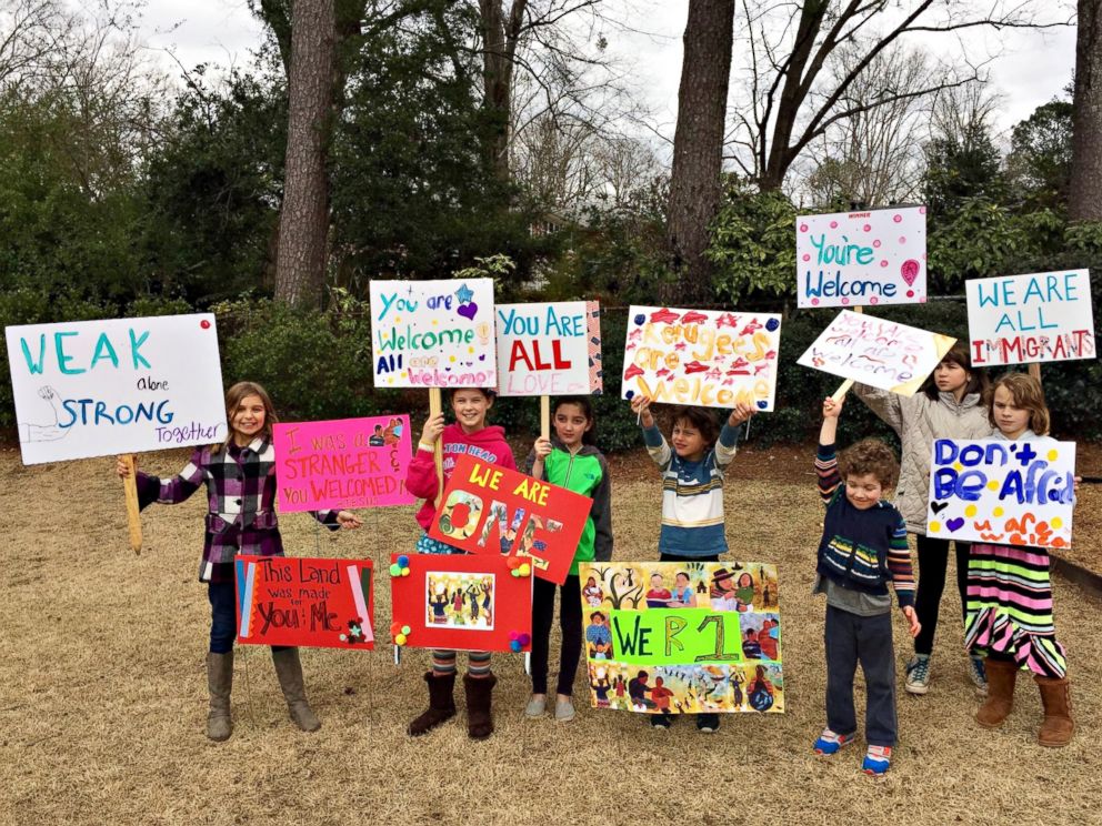 PHOTO: Danny Vincent hosted a sign-making party with family and friends in her DeKalb County, Georgia, home to make signs of support for the International Community School. 