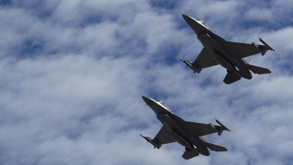 Two F-16 Fighting Falcons fly in formation over Holloman Air Force Base, N.M. on Sept. 13, 2016, in front of 160 spectators participating in Holloman's annual Phantom Society Tour.

