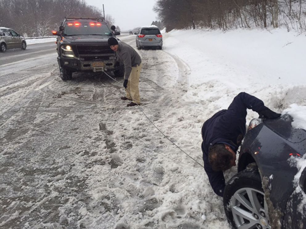 PHOTO: Gov. Andrew M. Cuomo stopped to help a stranded motorist on the Sprain Brook Parkway near Hawthorne, NY after having briefings with senior administration officials in New York City in regard to today's winter storm. 
