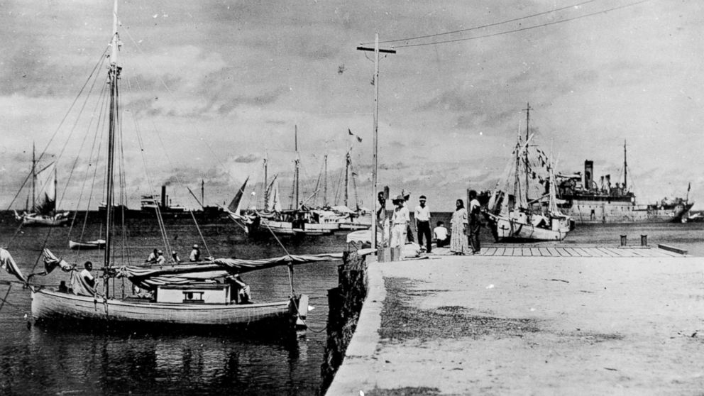 A HISTORY two-hour special "Amelia Earhart: The Lost Evidence," premiering July 9, 2017, includes this never-before-seen photo presumed to be of the American Aviator Amelia Earhart and navigator Fred Noonan after their crash-landing in the Marshall Islands. 
