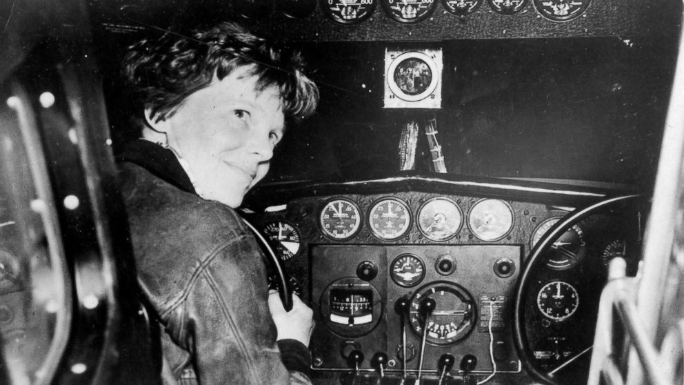 PHOTO: Amelia Earhart in the cockpit of a plane. 