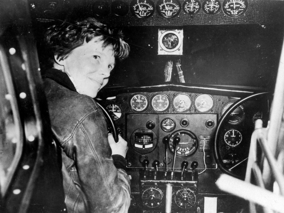 PHOTO: Amelia Earhart in the cockpit of a plane.