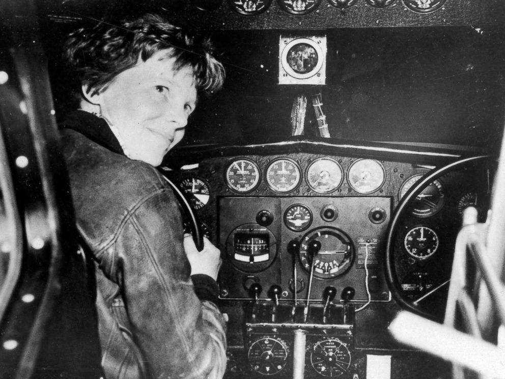 PHOTO: Amelia Earhart in the cockpit of a plane. 