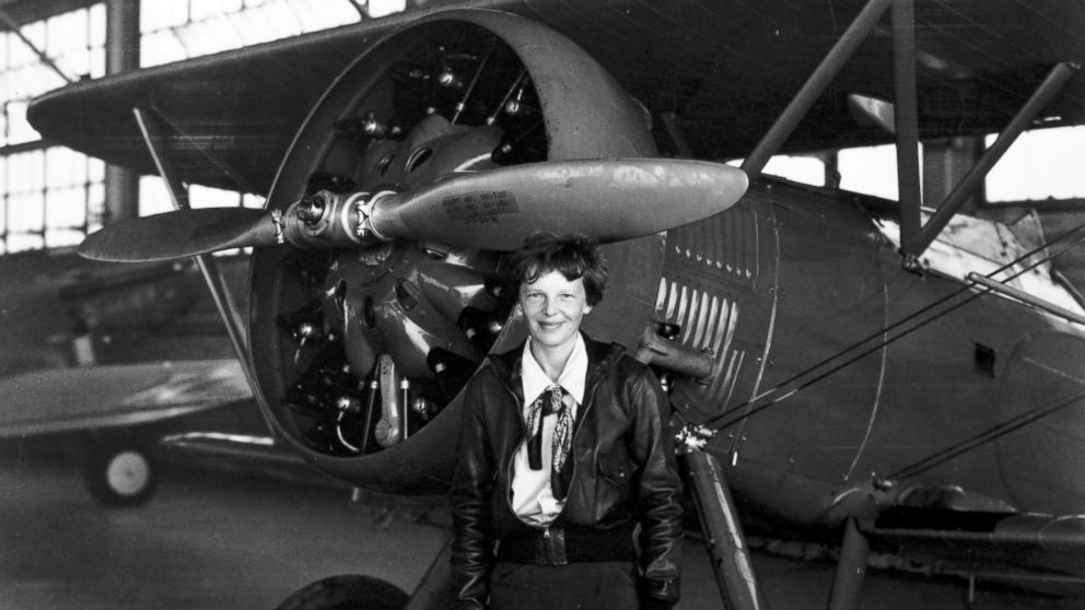 Amelia Earhart poses in front of a plane. HISTORY is airing the two-hour special "Amelia Earhart: The Lost Evidence" on July 9, 2017, unveiling original documents and new information about the fate of the aviator. 
