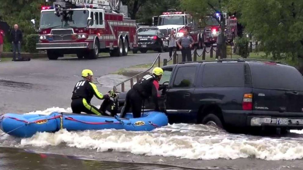 Firefighters Rescue Woman From Suv Stuck In Rising Floodwaters Abc News