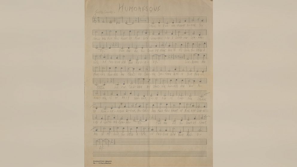 Handwritten musical manuscript of 'Humoresque,' unsigned, written in pencil by Al Capone, while at Alcatraz, on an off-white 9.5 x 12.55 musically lined sheet.