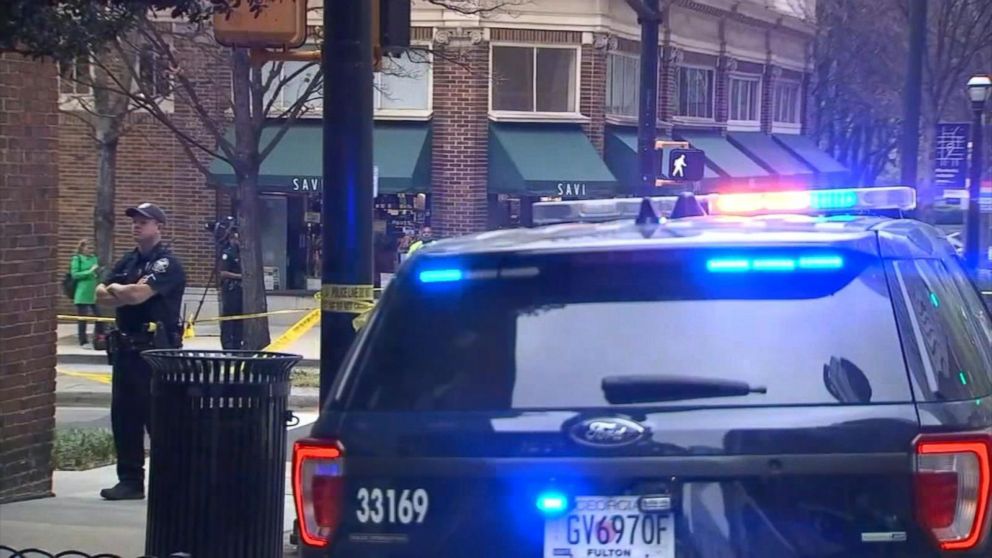 PHOTO: This still from video shows police in Midtown Atlanta after the "targeted" killing of a woman in broad daylight by a gunman, Apr. 3, 2017.