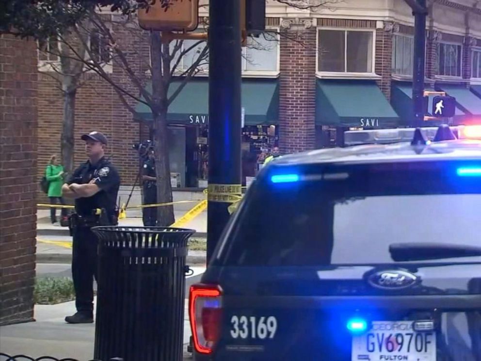 PHOTO: This still from video shows police in Midtown Atlanta after the targeted killing of a woman in broad daylight by a gunman, Apr. 3, 2017.