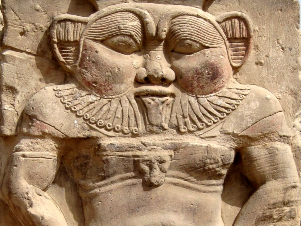 PHOTO: Relief of the god Bes next to the Roman north gate of the temple complex of Dendera, Egypt.