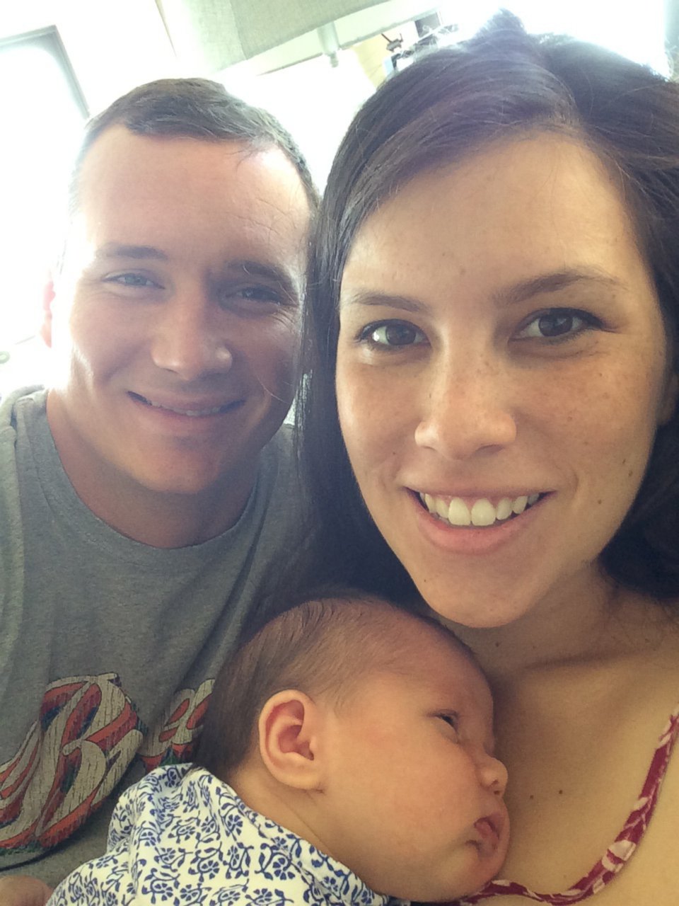PHOTO: Colin Goddard, now 31, seen in an undated photo with his wife, Gabriella and their child.