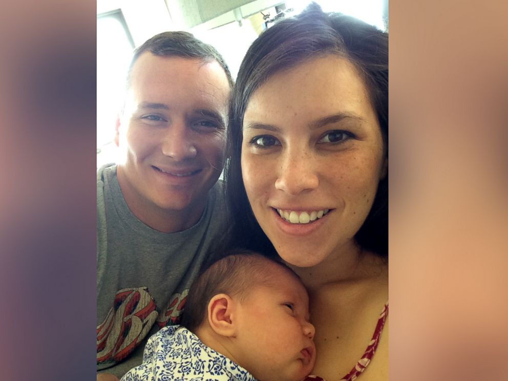 PHOTO: Colin Goddard, now 31, seen in an undated photo with his wife, Gabriella and their child.