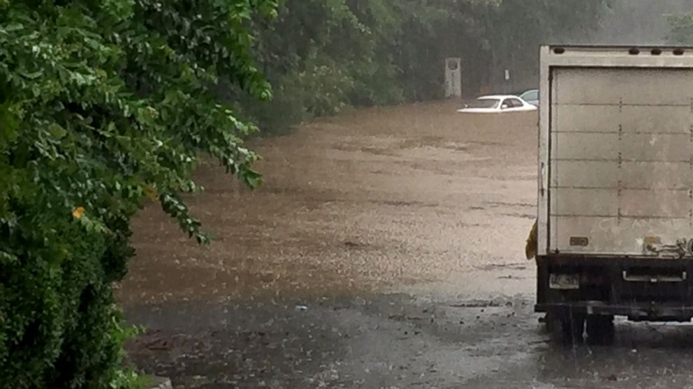 First responders save up to 27 people from flooded parking lot in