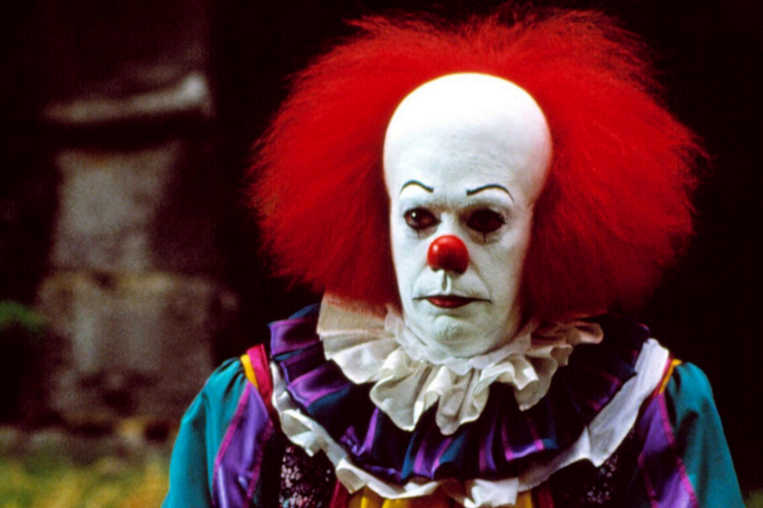 PHOTO: Tim Curry as Pennywise in a scene from "It."