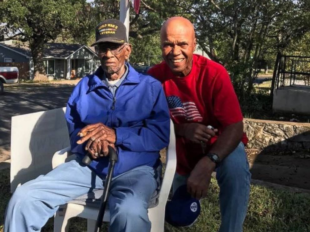 Volma Overton Jr., right, is pictured with Richard Overton, a World War II veteran who has lived in his Austin, Texas, home since the 1940s.