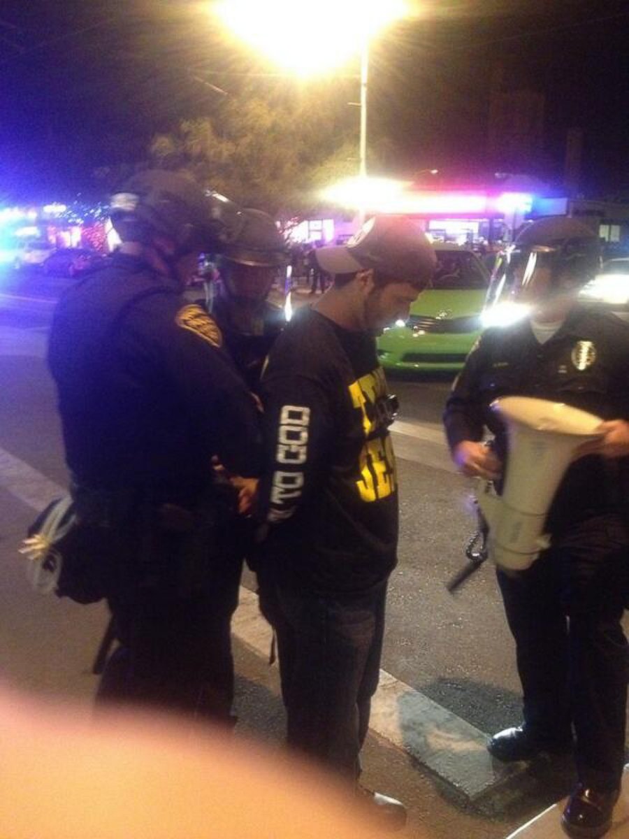 PHOTO: Brother Dean taken into custody by TPD Officers.