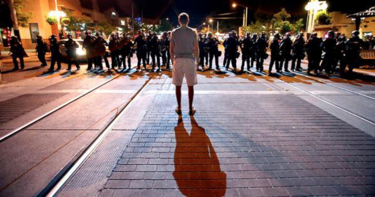 PHOTO: Lone man confronts Tucson Police.