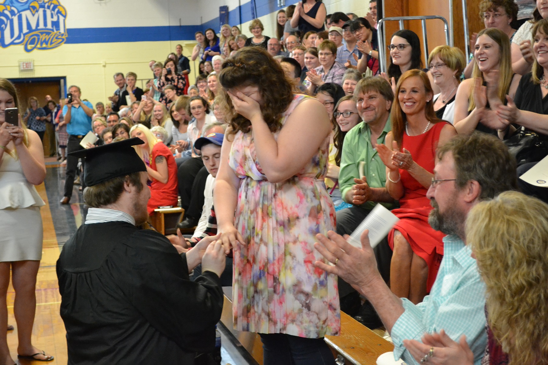 PHOTO: Timothy Babine and Hayley Hamilton are all smiles after UMPI helped Babine pull off a surprise marriage proposal to Hamilton during the university's 107th graduation ceremony on May 14. She said yes! 