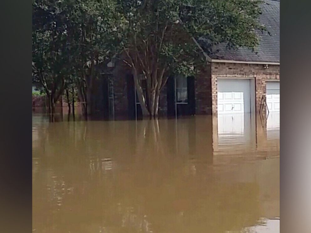 PHOTO: Cates' neighbor Cindy Nguyen took this photo of Cates' home while she was being evacuated in Baton Rouge, Louisiana, Aug. 2016.