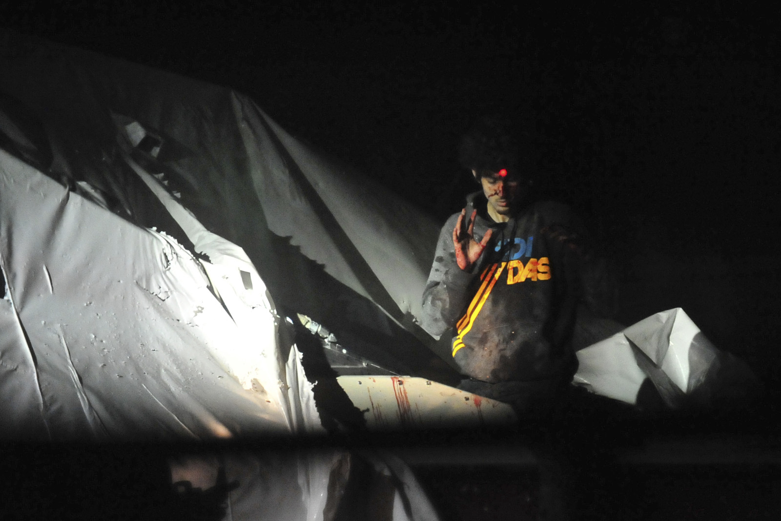 PHOTO: A sniper trains his bead on Dzhokhar Tsarnaev on April 19, 2014 him in Watertown, Mass.