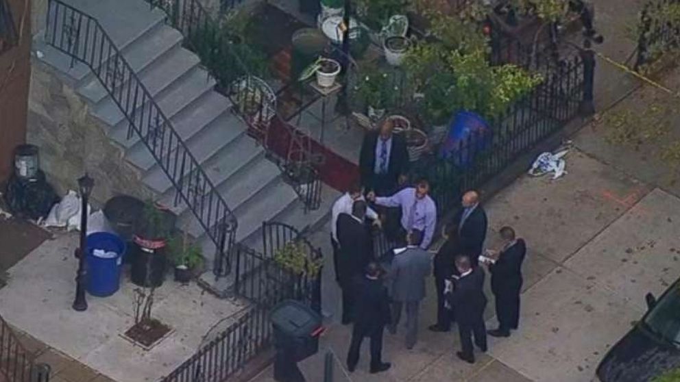PHOTO: Police investigate a crime scene in Brooklyn, New York, where an elderly couple was robbed on Wednesday. 