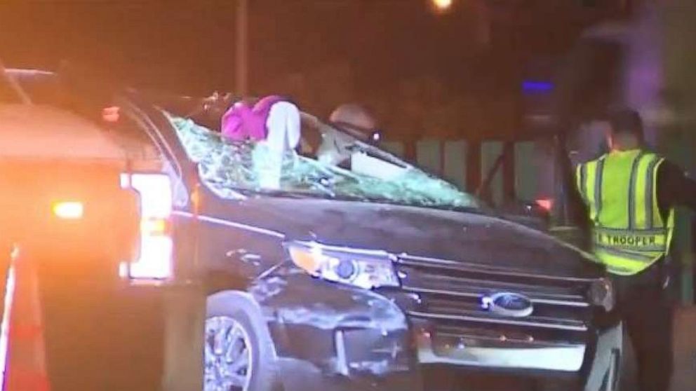 Authorities investigate the scene of a fatal crash on Interstate 95 in Oakland Park, Florida.