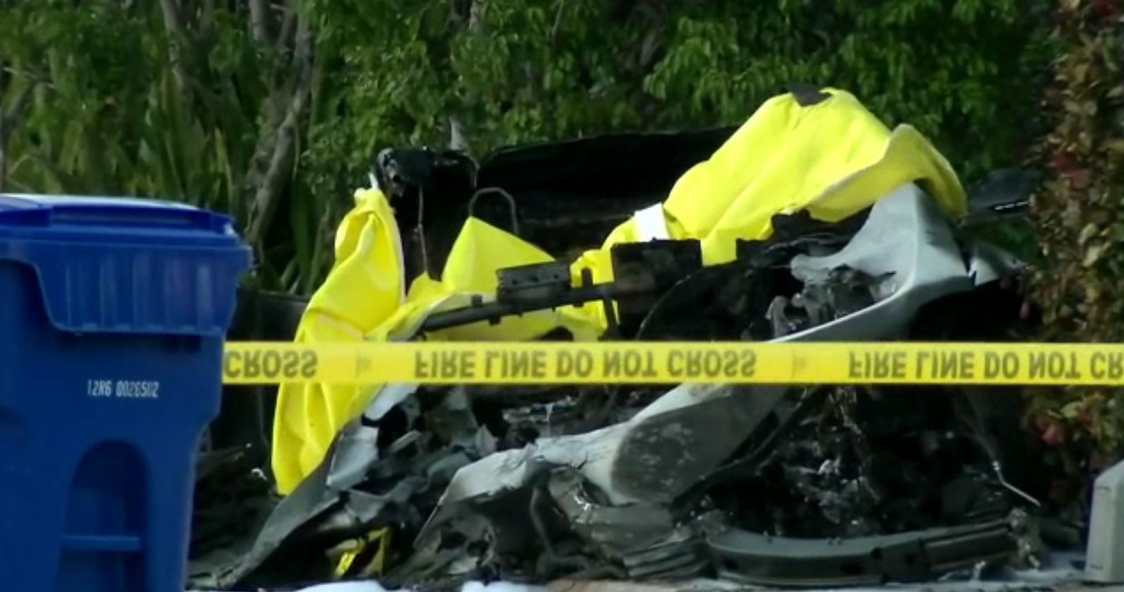PHOTO: Police investigate a deadly Tesla crash and fire that took the lives of two Florida high school students.
