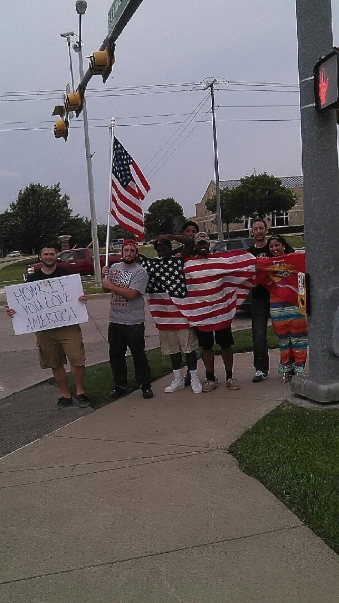 Residents in Garland, Texas, joined Joseph Offutt, 21, outside Curtis Culwell Community Center on April 6, 2015.