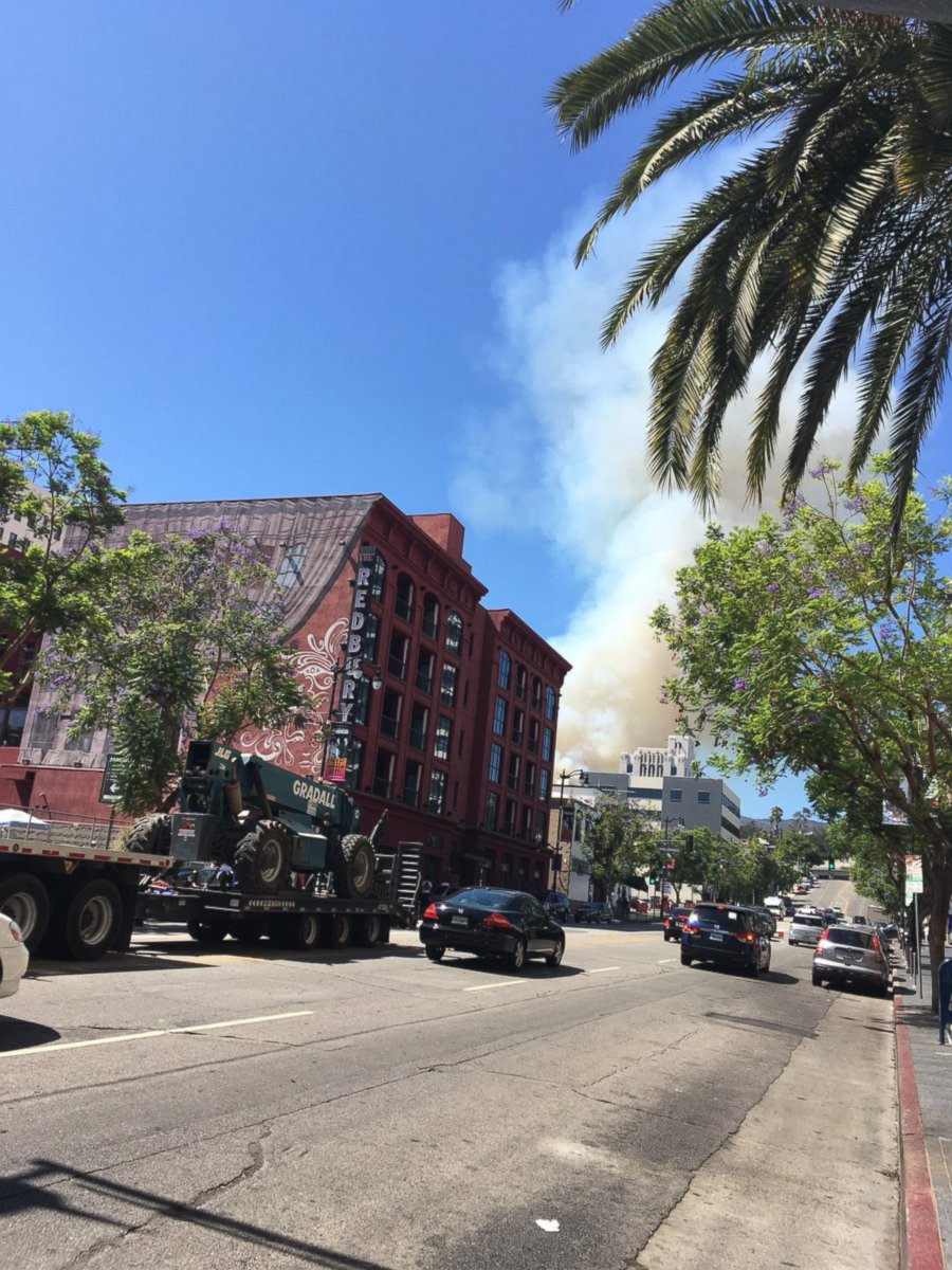 PHOTO: A brush fire burning in the Hollywood Hills in Los Angeles, as seen from Vine St. in Hollywood, on July 19, 2016.