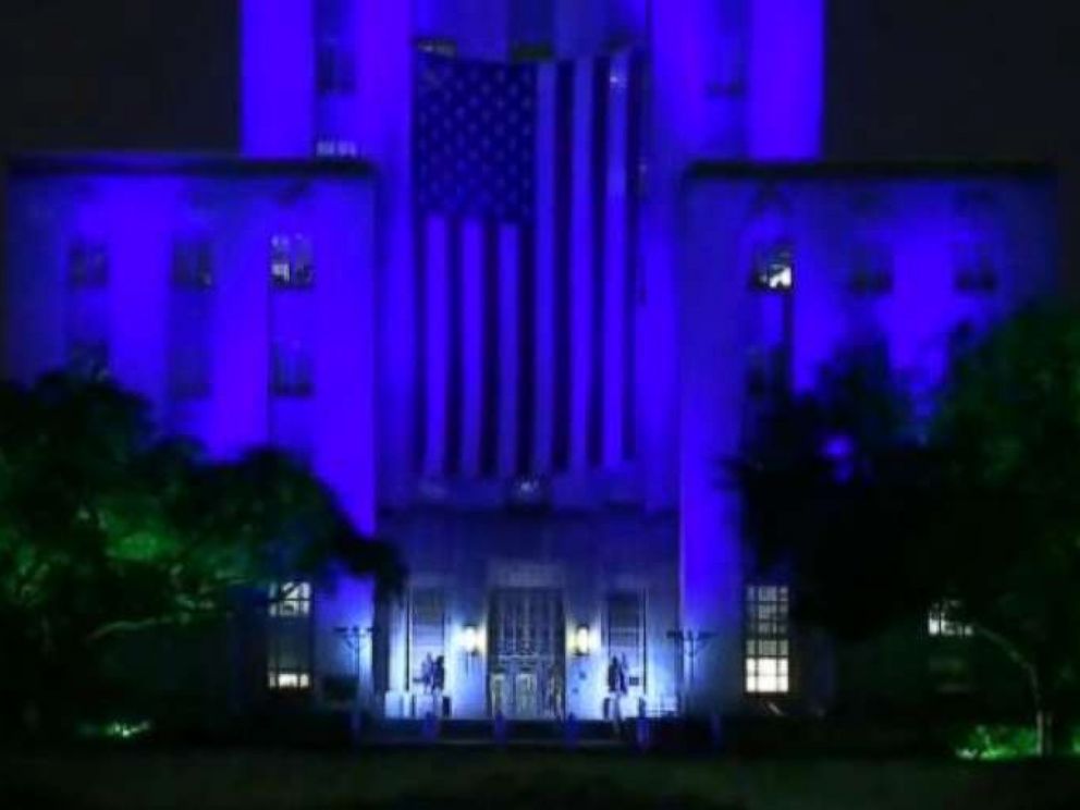 PHOTO: Houston’s City Hall building lit up in blue, Bush’s favorite color, as a part of a multi-day tribute to her on Wednesday.