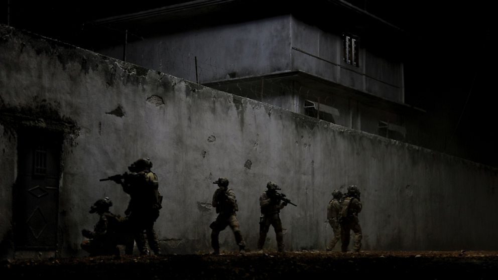 In the darkest hour of the night, elite Navy SEALs raid Osama Bin Laden's compound in Columbia Pictures' ultra realistic new thriller from director Kathryn Bigelow, about the greatest manhunt in history, "Zero Dark Thirty."