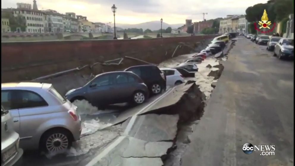 PHOTO: This 200-meter-long sinkhole created chaos in a Florence, Italy tourist neighborhood on May 25. 
