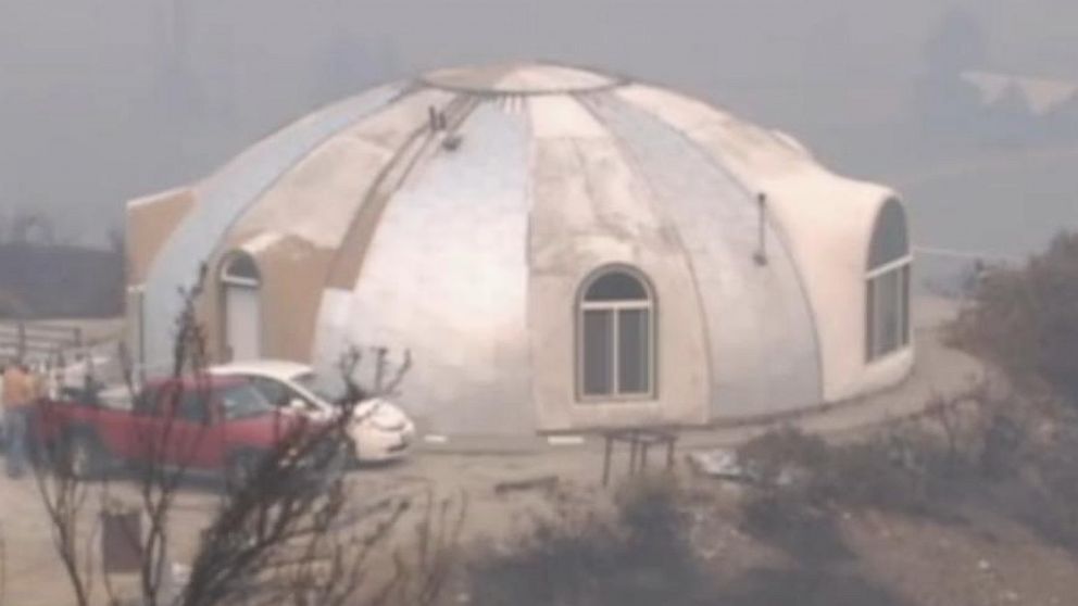 The cement monolithic dome, built by John Belles in 1999, survives fire on Aug. 22, 2015 in Omak, Wash.