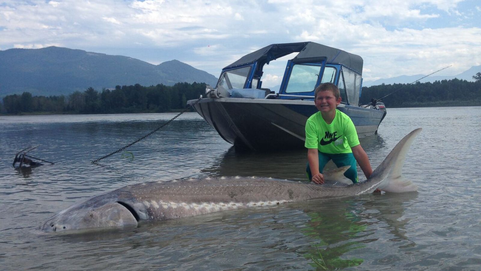 9-Year-Old Boy Reels in 600-Pound Sturgeon and There's Video to