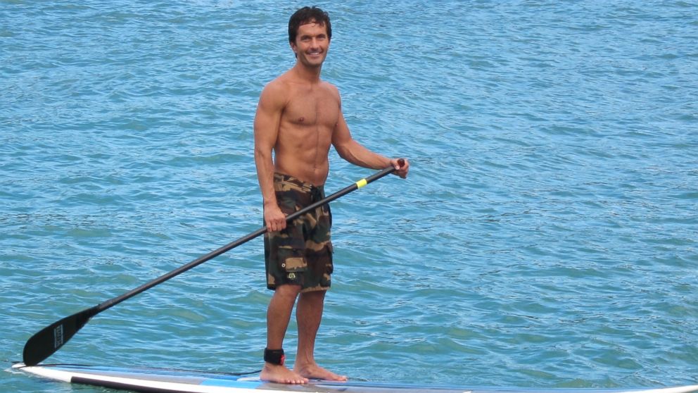 Khalil Rafati is shown here paddle-boarding in Kauai, Hawaii.