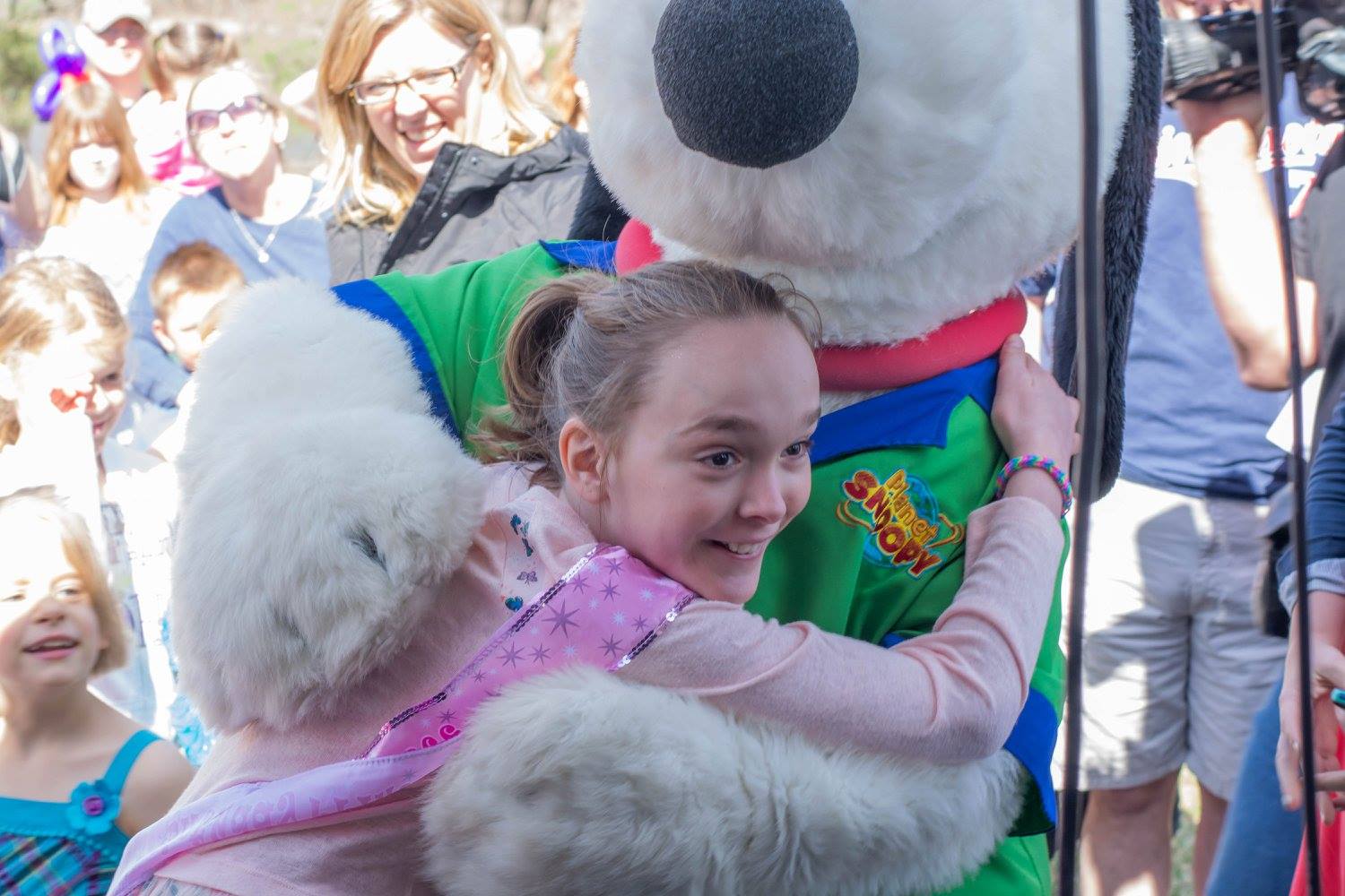 PHOTO: Mackenzie Moretter, turning 10 on April 21, 2015, is pictured here with a Snoopy mascot from Valleyfair Family Amusement Park at her birthday party in Shakopee, Minn., on April 18, 2015.