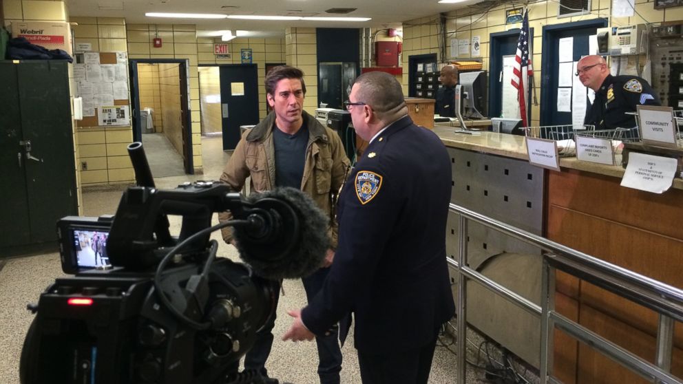 PHOTO: Muir with Deputy Insp. Joseph Gulotta, commander of the 67th Precinct in Brooklyn, in the stationhouse.