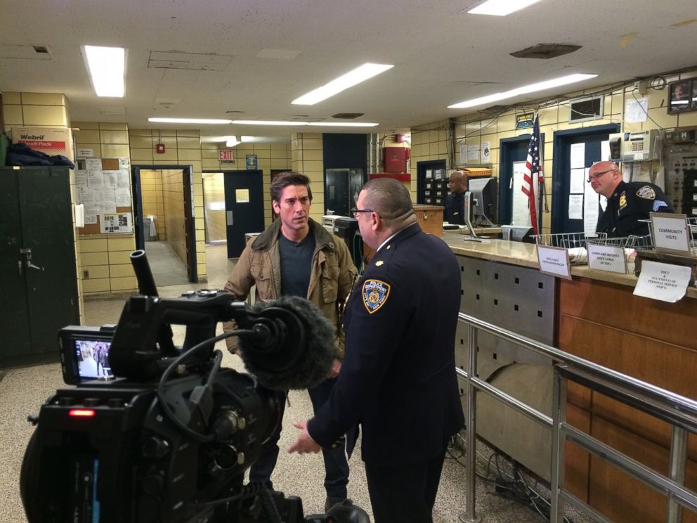 PHOTO: Muir with Deputy Insp. Joseph Gulotta, commander of the 67th Precinct in Brooklyn, in the stationhouse.