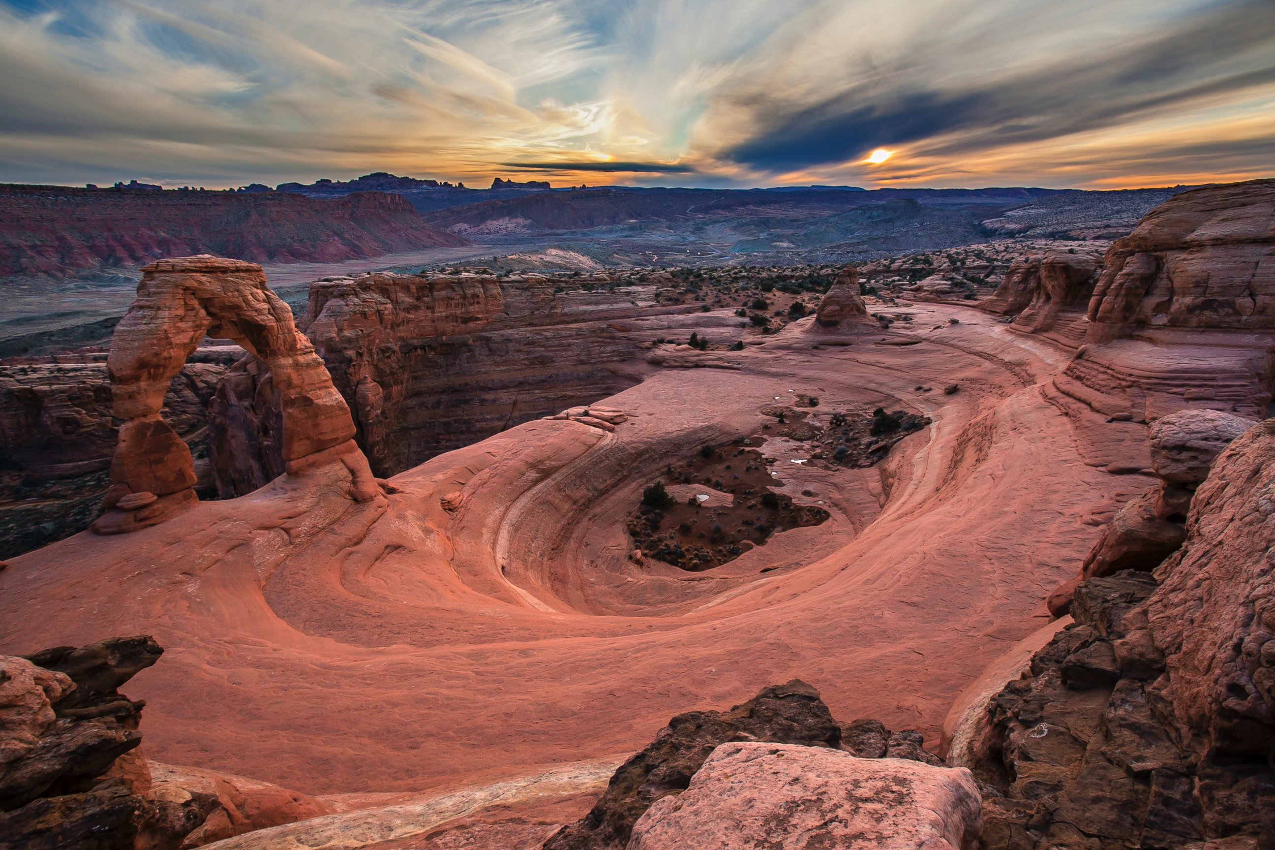 PHOTO: Cloudy Sunset at Delicate Arch, Arches National Park.