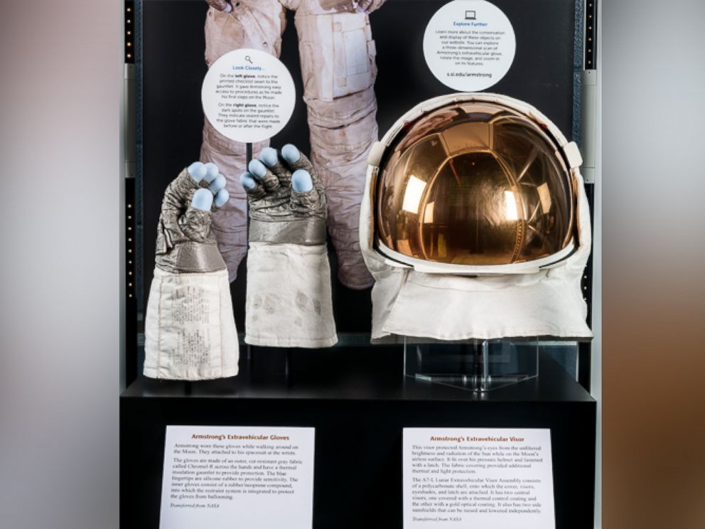 PHOTO: An exhibit of "Neil Armstrong's Apollo 11 Visor and Gloves," featuring flown Apollo A-7L spacesuit extravehicular visor and gloves in the James S. McDonnell Space Hangar at the National Air and Space Museum's Udvar-Hazy Center, Chantilly, Virginia.