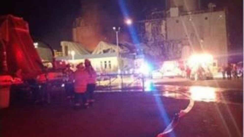 Emergency officials respond to an explosion at the Didion Milling plant in Cambria, Wisconsin. 
