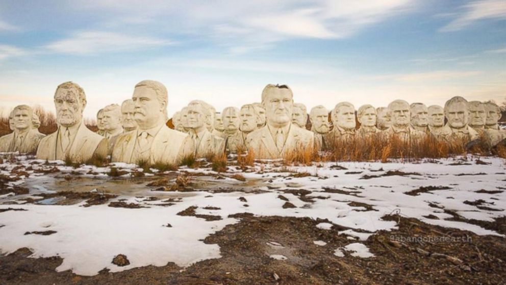 Stone busts of former U.S. Presidents sit in a field near Williamsburg, Virginia. The 20-foot-tall heads were saved from a nearby presidential museum when it closed in 2010.