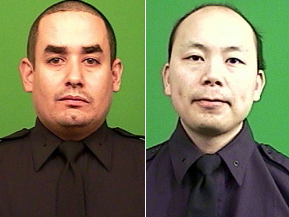 PHOTO: New York Police Department officers Rafael Ramos, left, and Wenjian Liu were killed, Dec. 20, 2014, as they sat in their car in the Bedford-Stuyvesant neighborhood of Brooklyn.